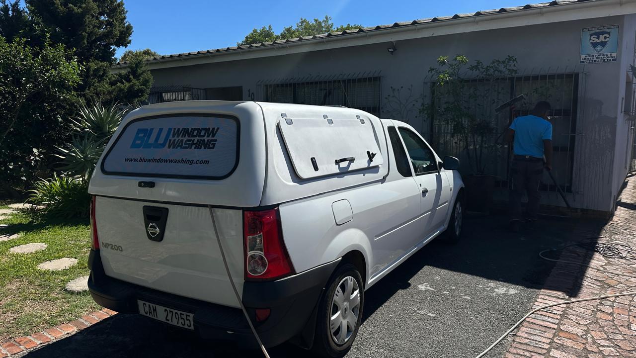The branded Blu Window Washing van parked at a Cape Town job
